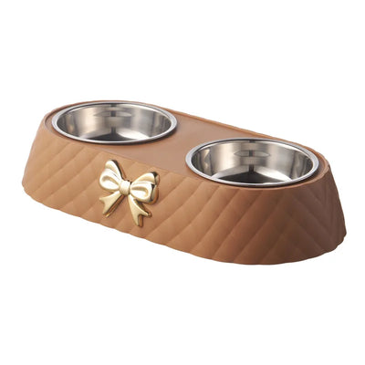 Light luxury pet double bowl in brown, green, and white, featuring a bow design for food and water.
