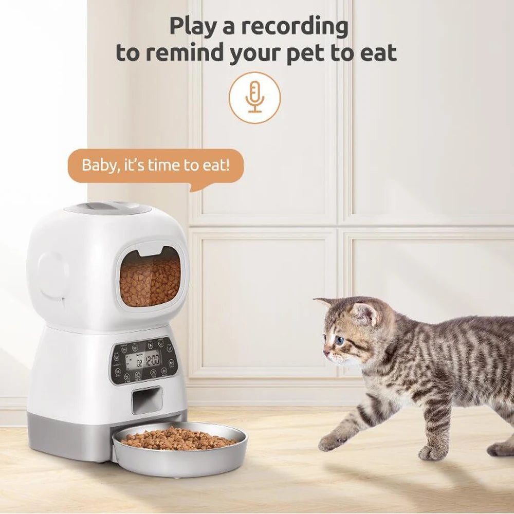 Automatic pet feeder for cats with LCD display and smartphone control, accompanied by a relaxed cat.
