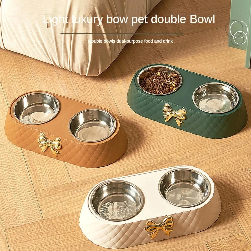 Light luxury pet double bowl in brown, green, and white, featuring a bow design for food and water.