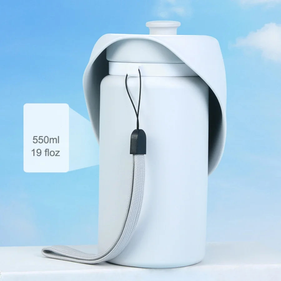 Portable dog water bottle with collapsible cup, perfect for outdoor adventures and hydration.