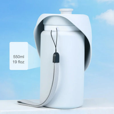 Portable dog water bottle with collapsible cup, perfect for outdoor adventures and hydration.